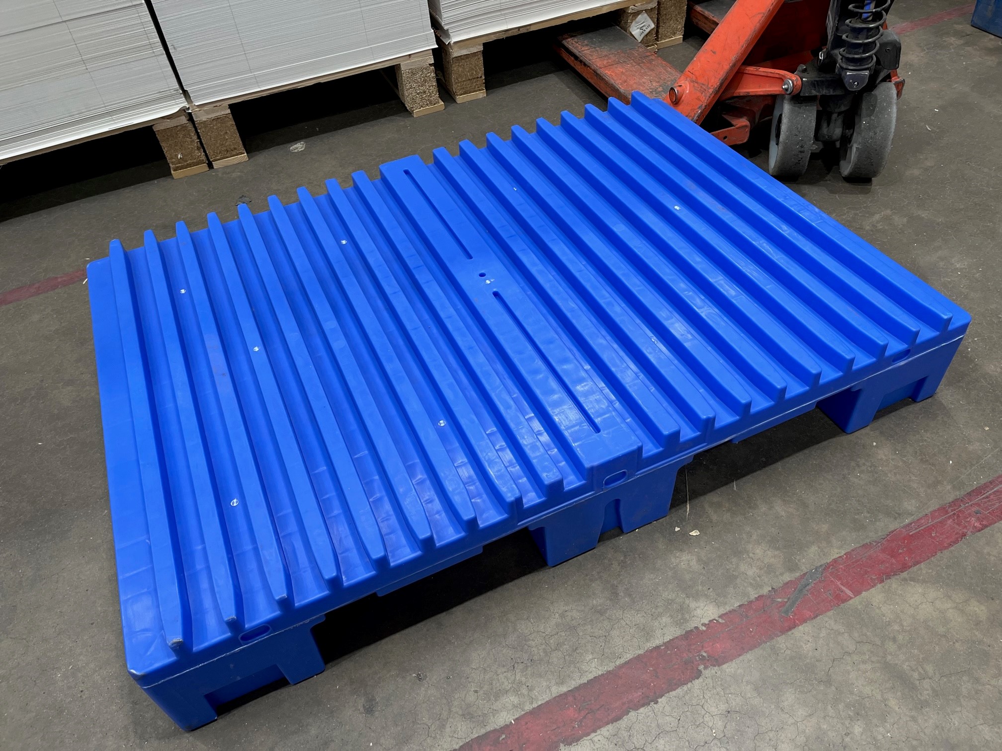 KEN WILKINS PRINT CONVERTS TO PLASTIC PALLETS TO IMPROVE THE EFFICIENCY AND SAFETY OF PRODUCTION