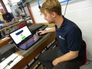 Image 3 Tool shop apprentice Kamil Stec creates a 3D digital drawing which is uploaded to the CNC mill to repeatedly reproduce complex shapes and textures