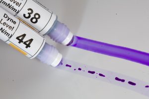 Side by side comparison of 38 and 44 dyne pen min