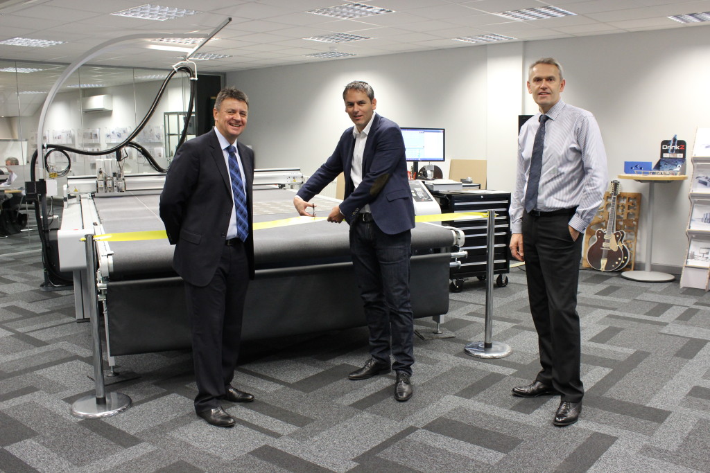 (L-R) Zünd UK managing director, Tim Taylor, Oliver Zünd and Peter Giddings officially cut the ribbon on the revamped demo suite